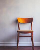 Wooden Chair Against A Light Grey Wall photo