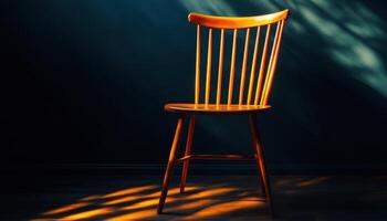 Wooden Chair Illuminated By Sunlight In A Dark Room photo