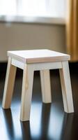 A Simple White Wooden Stool Against a Window Background, Minimalist Home Decor, Modern Interior Design Element photo