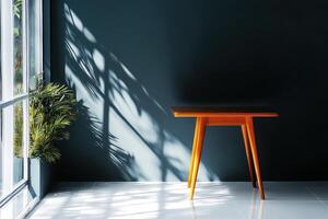 Sunlit Minimalist Interior Design Wooden Table by Window with Plant and Teal Wall photo
