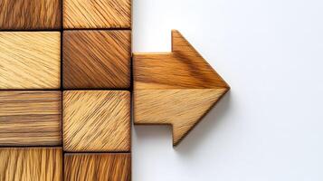Wooden right arrow constructed from geometric blocks highlights natural grain texture in minimalist design, arranged with light wooden elements on clean white backdrop. joinery photo