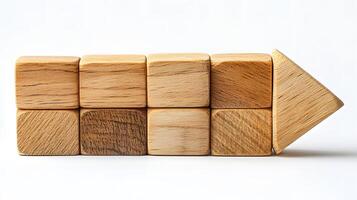 Wooden right arrow constructed from geometric blocks highlights natural grain texture in minimalist design, arranged with light wooden elements on clean white backdrop. natural photo