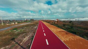 Fast Rush Over A Colorful Path Cycle Near The Sea video