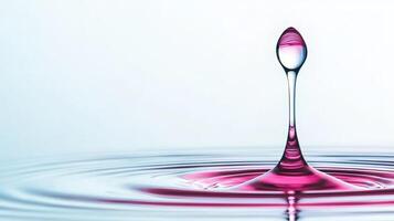Abstract Pink Water Drop Impacting Calm Surface Ripples Macro Photography photo