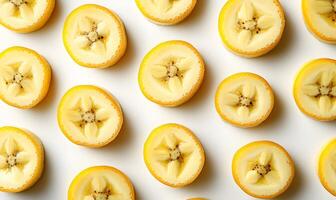 Sliced Bananas Arranged In A Repeating Pattern photo