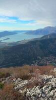 Panoramic view of Kotor Bay Boca and mountains from mountain view point in Montenegro in winter time. High quality 4k footage video
