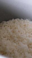 rice cooker Close-up view of hands opening and lifting rice pot out of multi-function pressure cooker. video