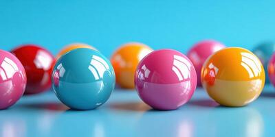 Colorful glossy spheres arranged on a blue surface reflecting light in a playful composition photo
