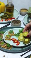 Chef arranging pattypan squash on appetizer plate video