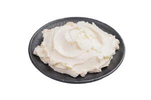 Creamy Homemade Mascarpone cheese, cream cheese isolated on white background. top view photo