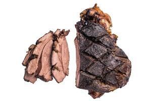 Roasted Roe Deer leg. slow cooked game meat of venison with bone isolated on white background. top view photo