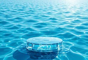 Empty clear glass circle podium on blue transparent calm water texture with waves in sunlight, Abstract nature background for product presentation, copy space, Summer products ideas photo