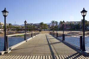 Relax on the beach with umbrellas and sun loungers photo