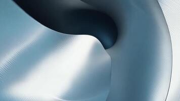 Swirling glossy elements blend seamlessly into each other, showcasing a captivating array of blue hues and textured surfaces that invite exploration of depth and form. video