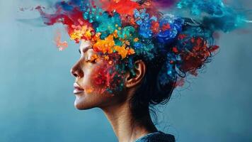 A woman with closed eyes embodies tranquility as vibrant colors and abstract forms swirl above her head, representing creativity and imagination in a striking display. video