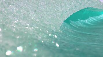 Abstract wave background with translucent crystal texture effect, pale turquoise with reflective facets, rendered in 3d video