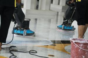 Professional Floor Cleaning Using Buffing Machines in an Indoor Setting photo