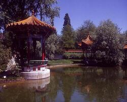 a graceful traditional Chinese building, featuring distinctive architecture such as layered curved roofs and ornate carvings. photo