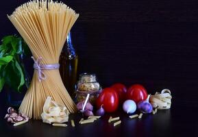 The ingredients suggest a culinary context and indicate the spaghetti's intended use. photo