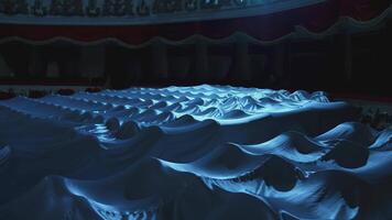 Theater hall at darkness. Empty theater with seats covered by white cloth after a performance. video