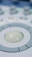 Round rotating button on the keyboard of modern medical equipment. Numerous buttons to manage machine for ultrasound diagnostics. video