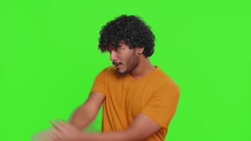 Man pointing around with finger gun gesture, looking confident shooting killing with hand pistol video