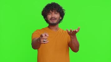 Indian man pointing at camera and showing stupid gesture, blaming some idiot plan, abuse, bullying video