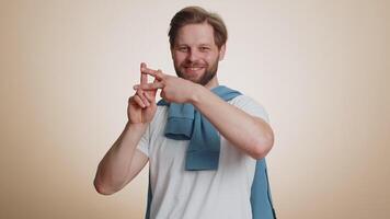 Man showing hashtag symbol with hands, likes tagged message, popular viral social media content video