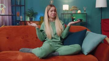 Young woman girl asking why, what reason of failure demonstrating disbelief irritation by troubles video