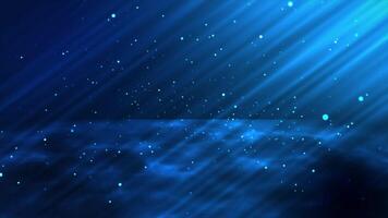 Abstract blue background with falling particles and light rays. video
