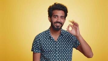 Man looking approvingly, showing ok approve feedback gesture like sign positive something good video
