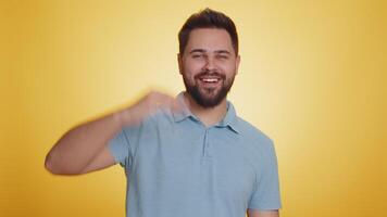 Man showing inviting gesture with hands, ask to join, beckoning to coming, gesturing hello goodbye video