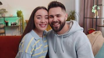 Portrait of happy smiling family marriage couple man woman looking at camera, hugging, embracing video