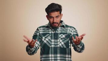 Man raising hands in indignant expression ask why what reason of failure demonstrating disbelief video