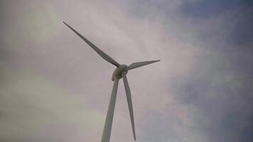 Ecological source of energy. Zipline Frottmaninger Berg. Turbine Frottmaninger Mullberg. Windmill in Muenchen at sunset. Renewable energy concept. Wind power plant in Bavaria. Windmill propeller. video