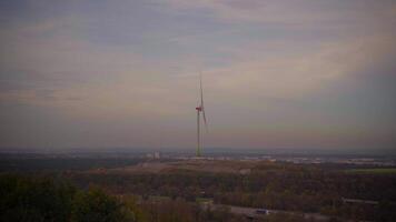 Ecological source of energy. Zipline Frottmaninger Berg. Turbine Frottmaninger Mullberg. Windmill in Muenchen at sunset. Renewable energy concept. Wind power plant in Bavaria. Windmill propeller. video