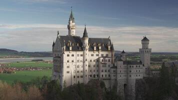 View of famous Neuschwanstein Schloss, Fussen, Bavaria, Germany, seen from Marienbrucke Marys Bridge, pedestrian bridge over cliff. Marienbrucke bridge an observation deck at Neuschwanstein castle. video