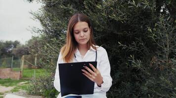 Medical Trainee Outside University In Park Repeats Lectures Before Exam video