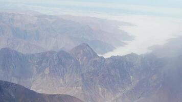 Andes Mountains And Clouds From Flight Peru South America Lima To Cusco video