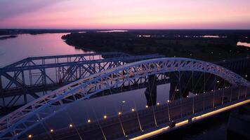 Vertical view from top down. Flying over the road bridge in the video