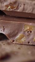 A CloseUp View of a Chocolate Bar Featuring Delicious Caramel Bits video