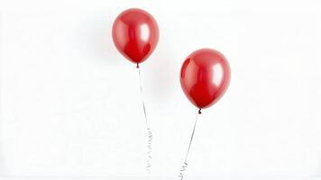 Two red balloons on white background. photo