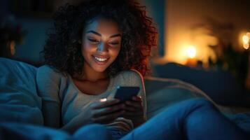 Nighttime comfort - a young woman in her cozy bedroom, smiling gently as she looks her phone, illuminated by soft, soothing light of night, reflecting a calm, personal moment of photo