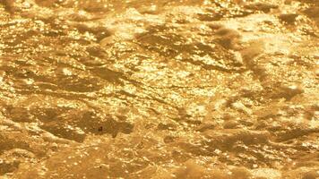 Gold Surface Texture Background Abstract - A close-up shot of a gold surface texture, showing the abstract patterns and details of the material. video