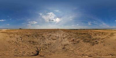 hdri 360 panorama on farming fields in spring nasty evening before sunset in equirectangular full seamless spherical projection, for VR AR virtual reality content photo