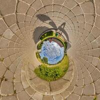 blue inside overlooking old town, urban development, historic buildings surrounded by a frame of paving slabs. Transformation of spherical 360 panorama in abstract aerial view. photo