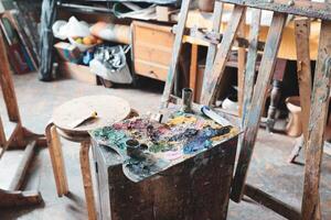 Artistic Studio featuring a Paint Palette and Easel for artistic creations and expressions photo