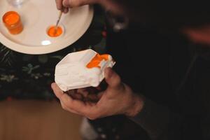 Engaging in Creative Crafting Projects using Orange Paint to Express Artistic Freedom and Style photo