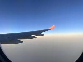 A beautiful aerial view seen from an airplane window during an exciting flight journey photo