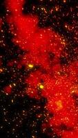 An endless stream of chaotic sparks rushing towards the sky against a background of red smoke. video